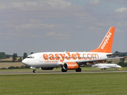 Photograph of Easyjet Boeing 737 on the runway at Luton Airport