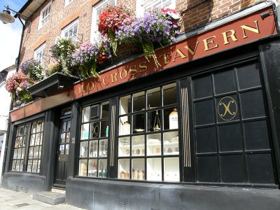 Photo of hanging baskets outside the Old Cross Tavern in St.Andrew Street, Hertford
